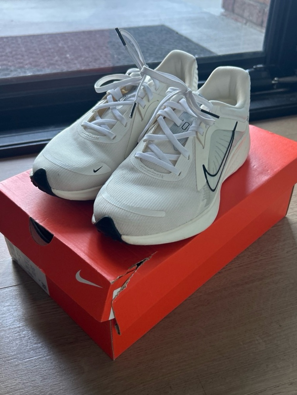 Nike Men's White Running Shoes with Black Swoosh Accent